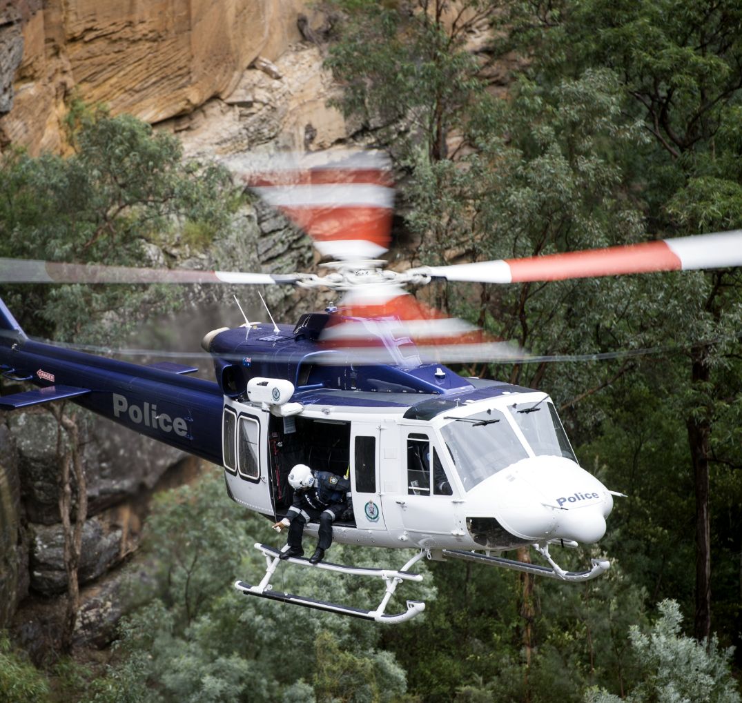 Helicopter flying in the wilderness